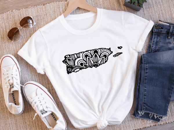 white tshirt with the puerto rico island filled with a mandala design