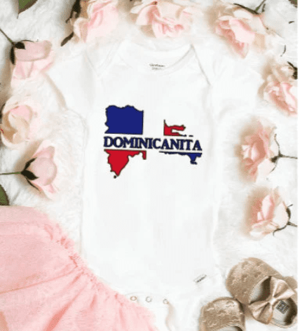 White baby bodysuit with the Dominican Republic island in the colors red and blue. The word Dominicanita is written through the center of the island.