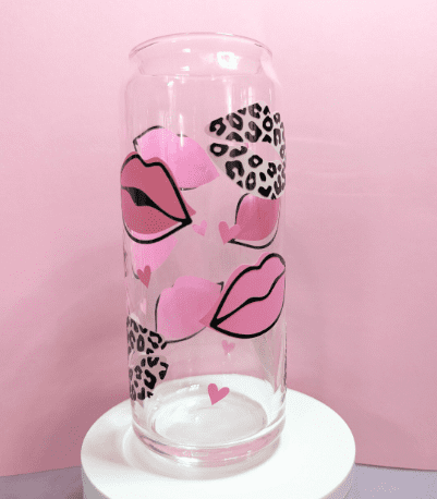 Glass can with pink lips and leopard overlay on lips