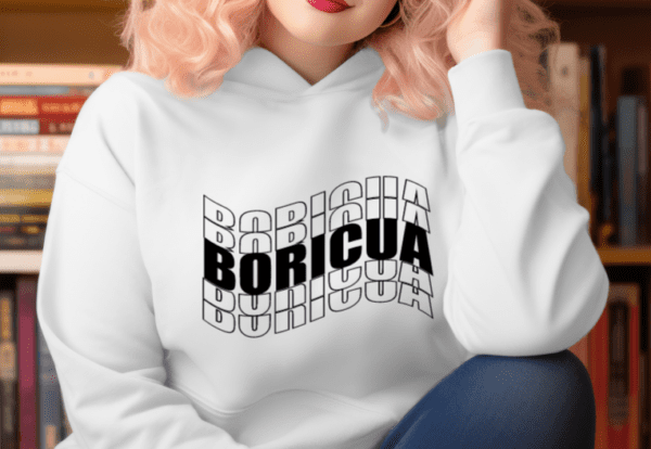 woman wearing a white hoodie with the word Boricua echoed and written in a wavy font in black