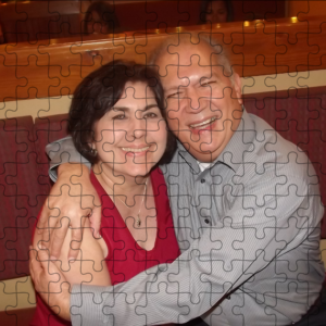 Puzzle with image of Couple hugging and smiling at the camera
