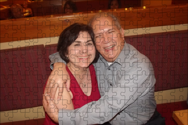 Puzzle with image of Couple hugging and smiling at the camera