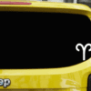 Yellow SUV with the Aries zodiac sign in the bottom right hand part of the back window.