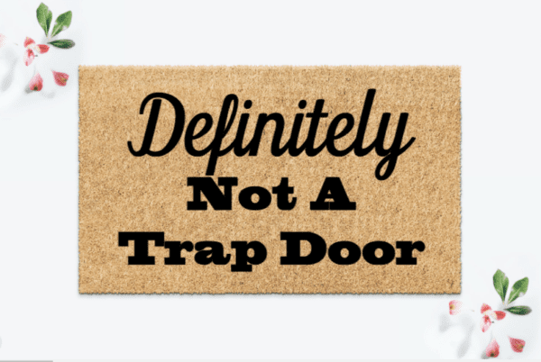 Coir Doormat with the funny phrase "Definitely Not a Trap Door"