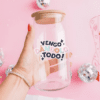 Clear Glass Can with the phrase "Vengo Dandolo Todo"