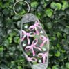 Clear Motel-style keychain with pink bows and white hearts